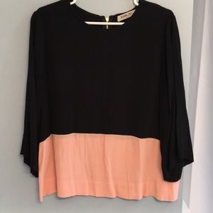 Adorable black and pink blouse.
